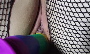 Dildo and fishnets